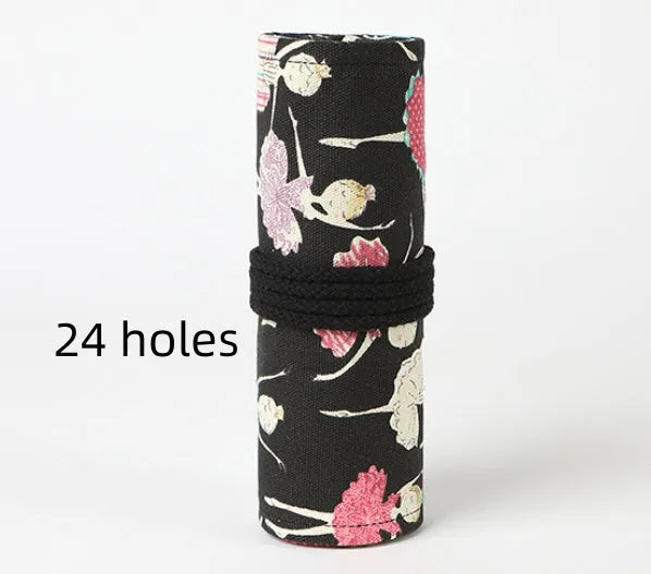 Square canvas rolling pencil case with ballet girl print, showing interior holes for storing pencils.