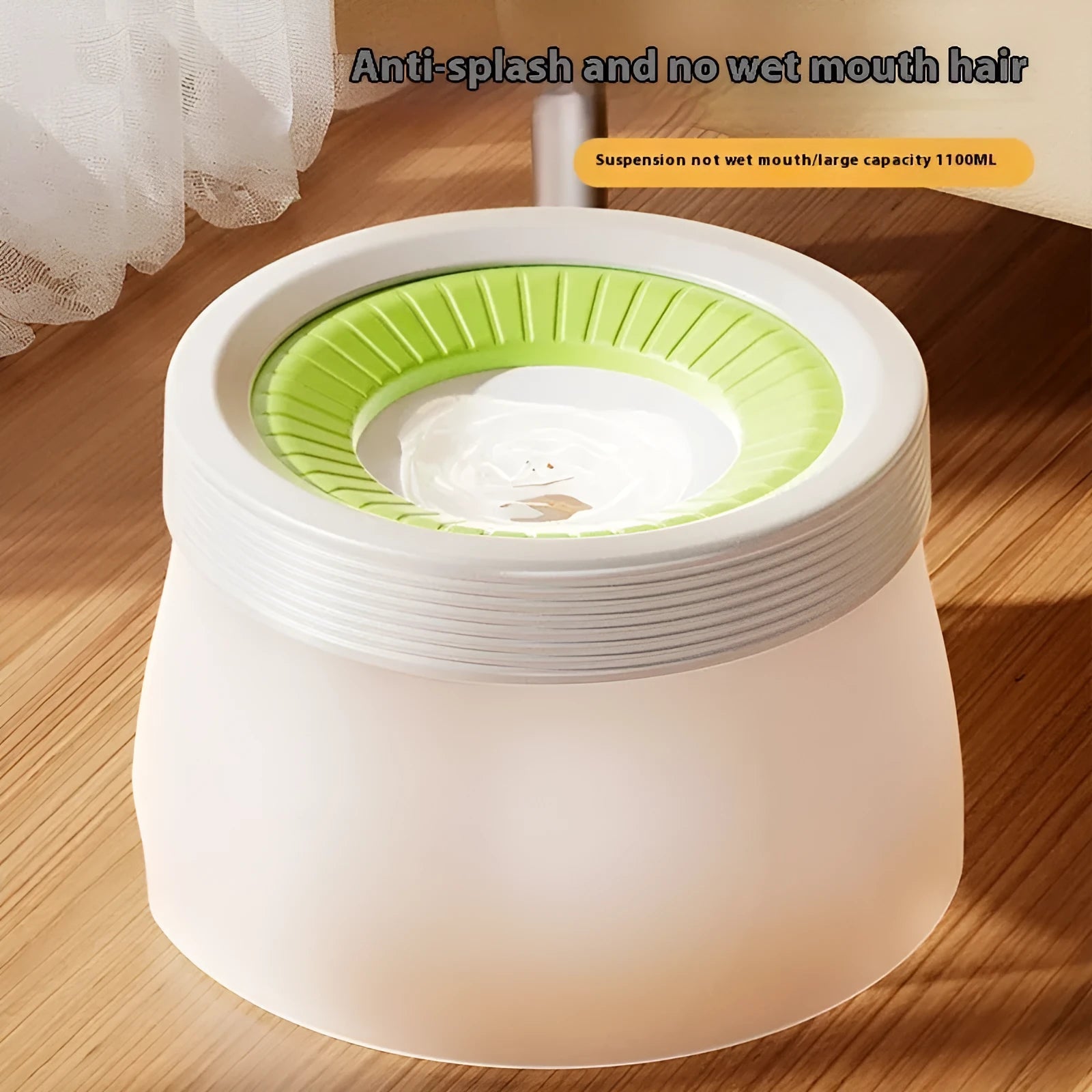 Blue suspended pet water bowl for dogs and cats on a white base plate, showing non-spill design.