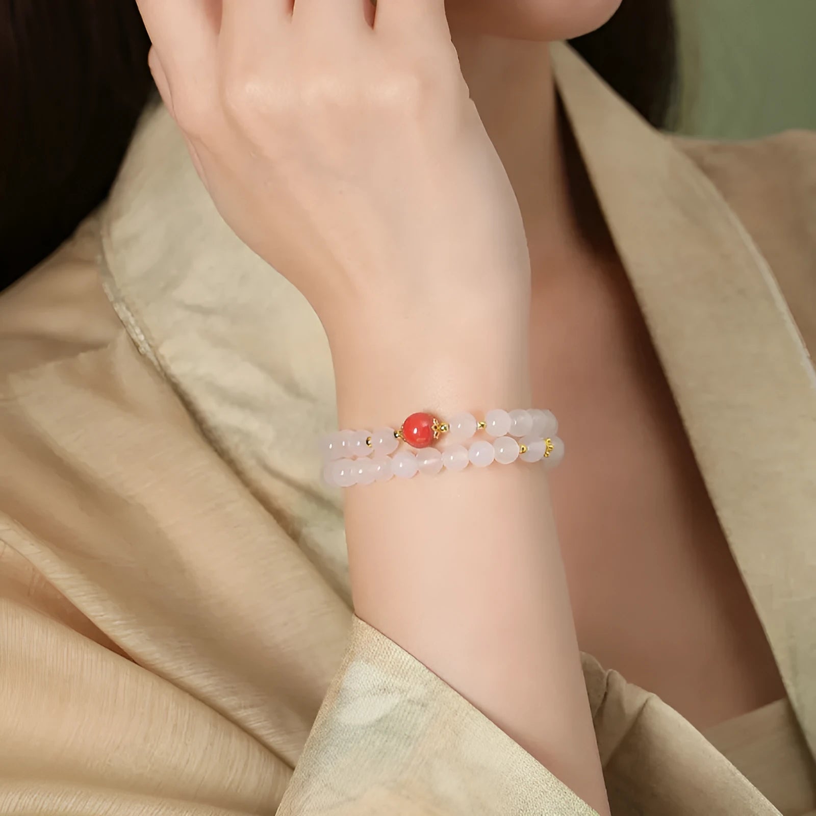 White agate bracelet with jequirity bean and cinnabar beads, 6mm polished geometric shape