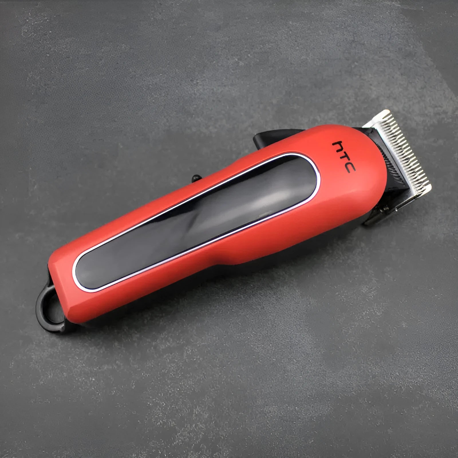 Professional rechargeable hair clipper in black, red, or white with four attachment combs and cleaning accessories.