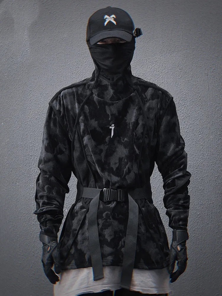 Black and grey tie dye printed men's turtleneck sweater with drop shoulders on a model.