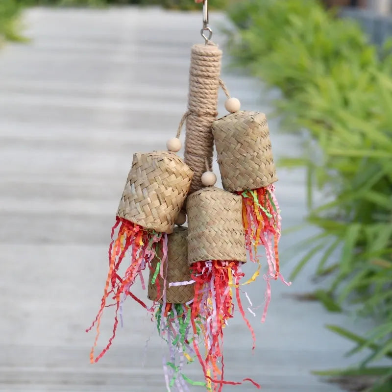 Natural wood and sisal rope parrot foraging toy with colourful shredded paper measuring 15cm by 35cm