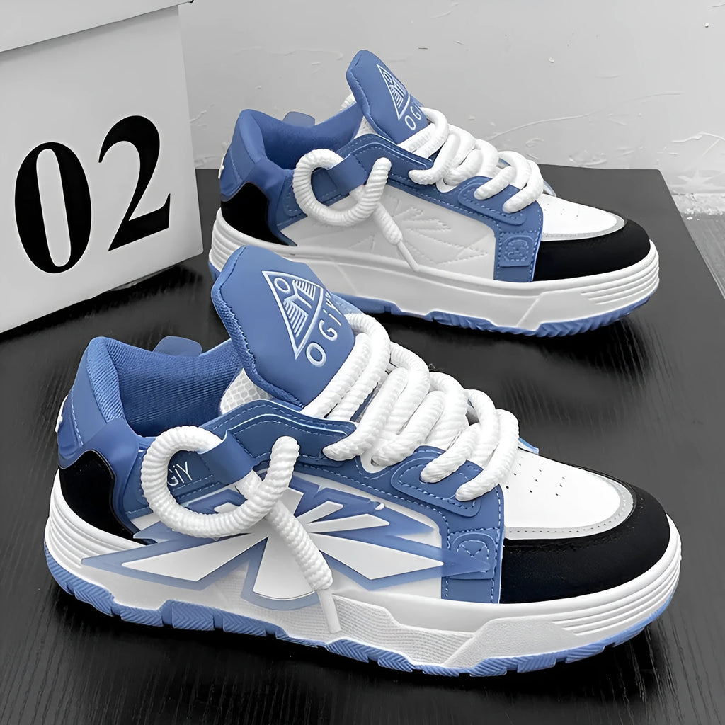 Men's white chunky sneakers with thick rubber sole and totem pattern detail on synthetic leather upper