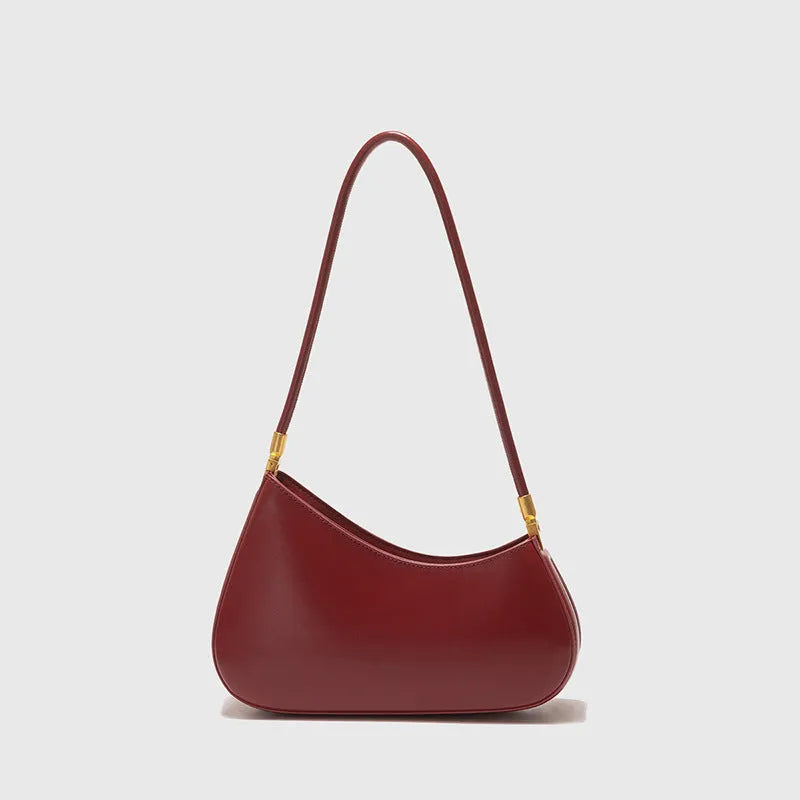 Women's oval shaped underarm bag in PU leather with single shoulder strap and internal zipper compartment