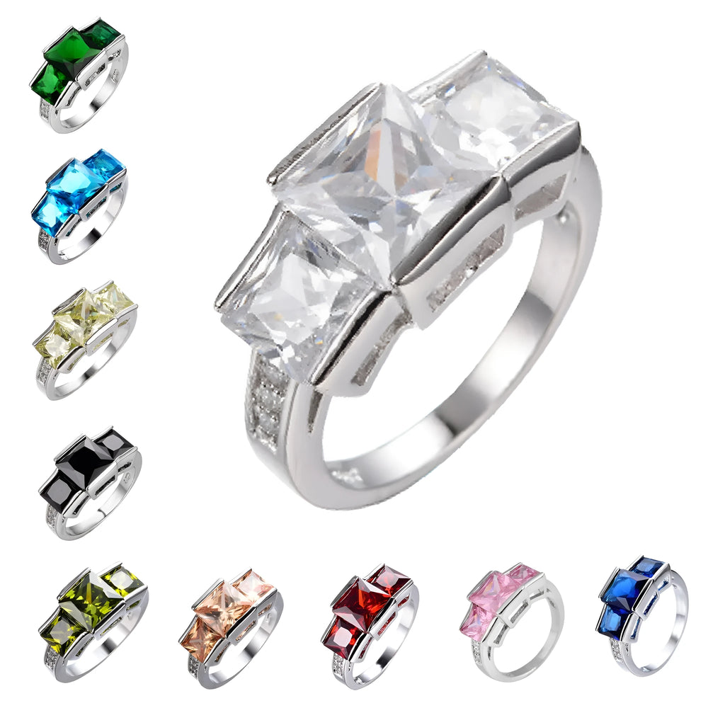 Women's copper alloy ring with electroplated geometric pattern in rainbow colours showing apple green option