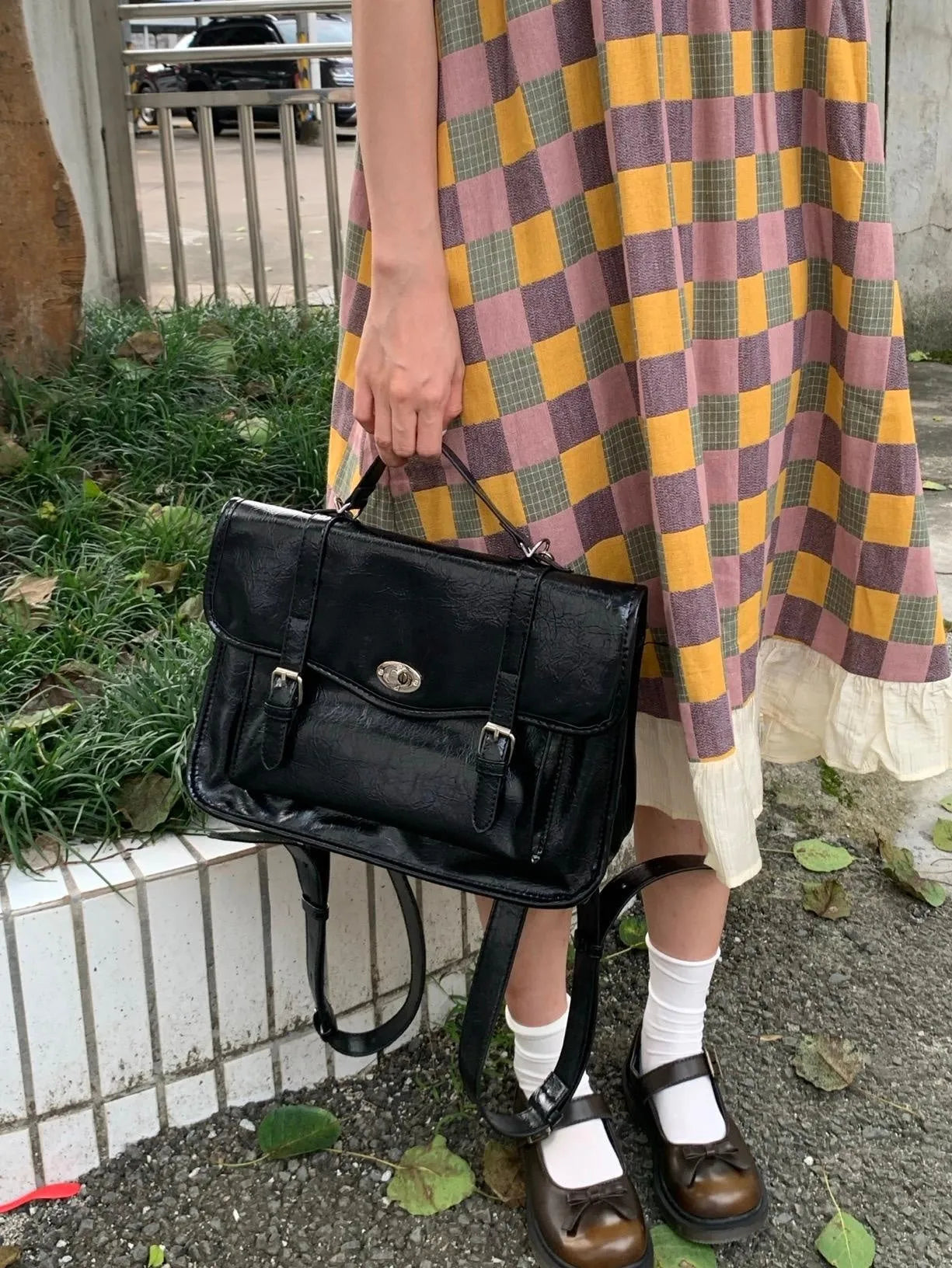Black college style messenger bag for women with oil wax PU leather finish showing 35cm length dimensions