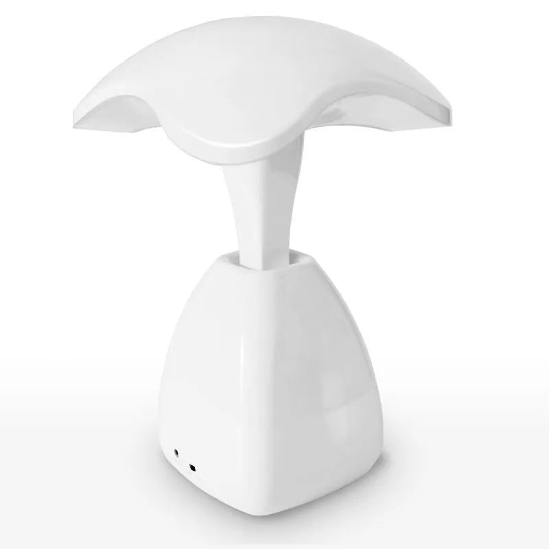 White modern LED desk lamp with plastic shade and touch controls for bedside or desk use
