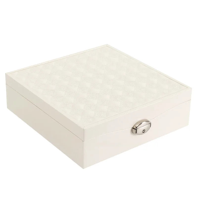 Red and white PU leather jewellery storage box with multiple compartments for necklaces and rings