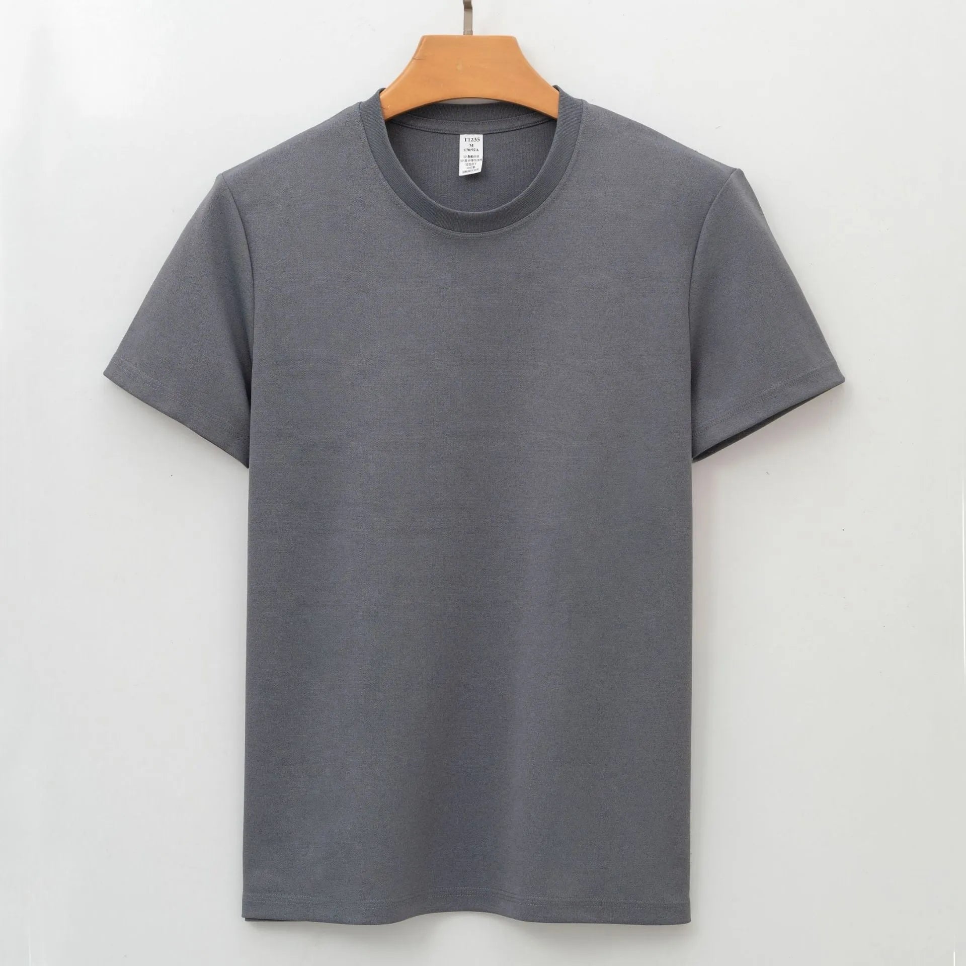 Men's solid colour quick-dry antibacterial short sleeve t-shirt on a hanger.