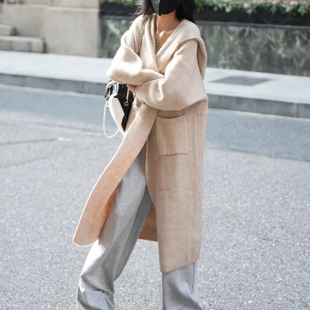 Long grey knitted cardigan hooded trench coat with splicing detail on mannequin