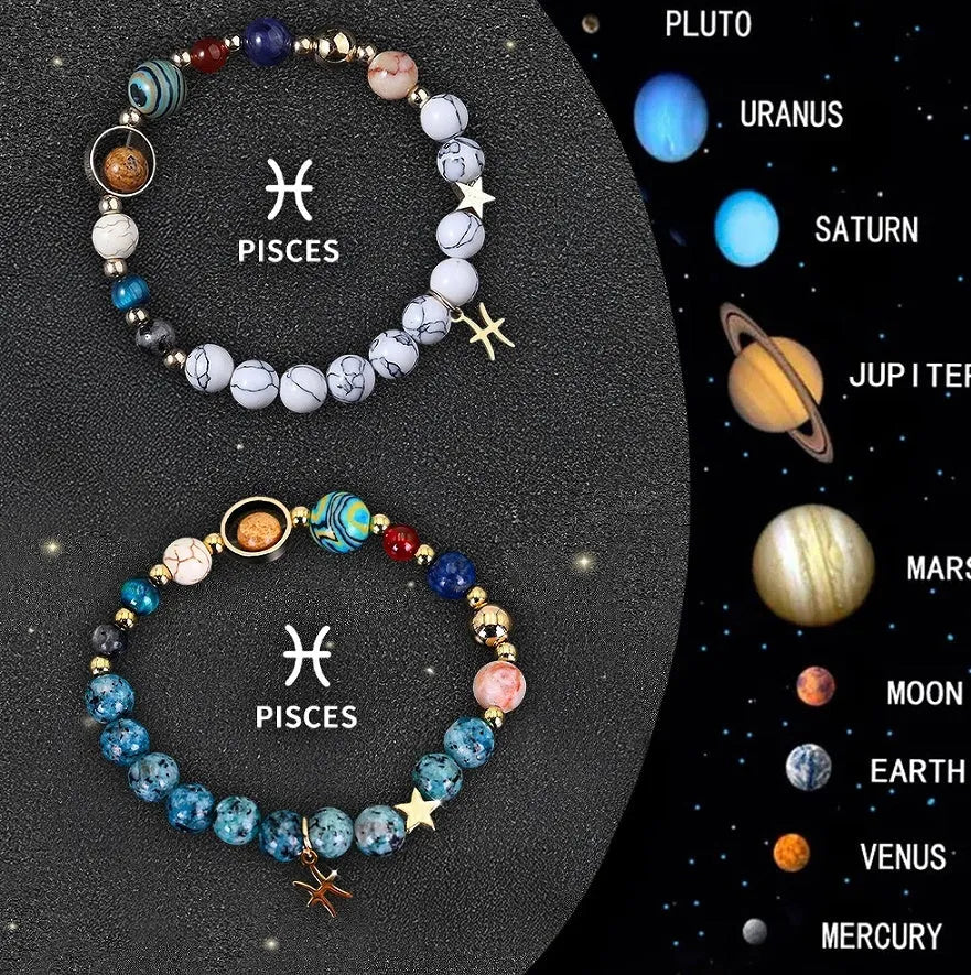 Set of two natural stone beaded bracelets featuring zodiac sign designs on a dark background