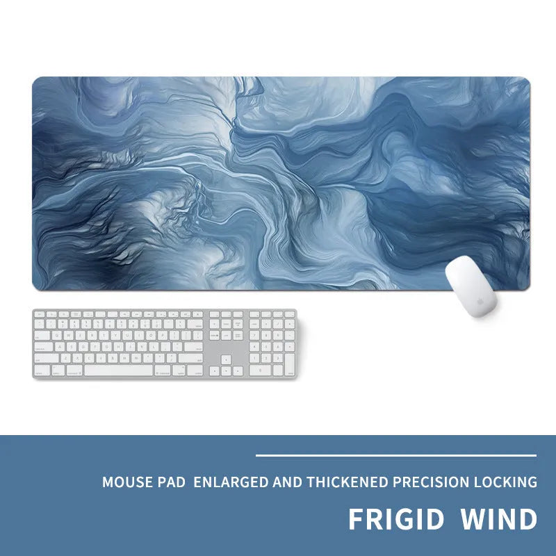 Oversized natural rubber gaming desk mat with graphical print, showing keyboard and mouse placement.
