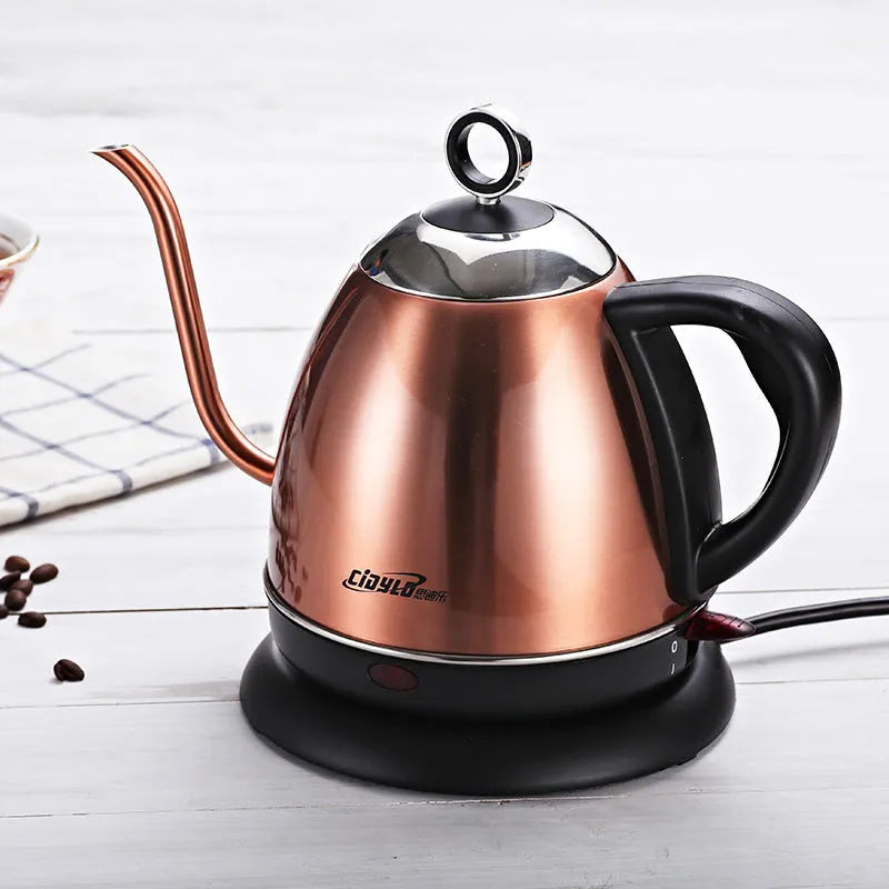 Gold automatic stainless steel kettle with touch controls and 1-litre capacity on a kitchen counter.