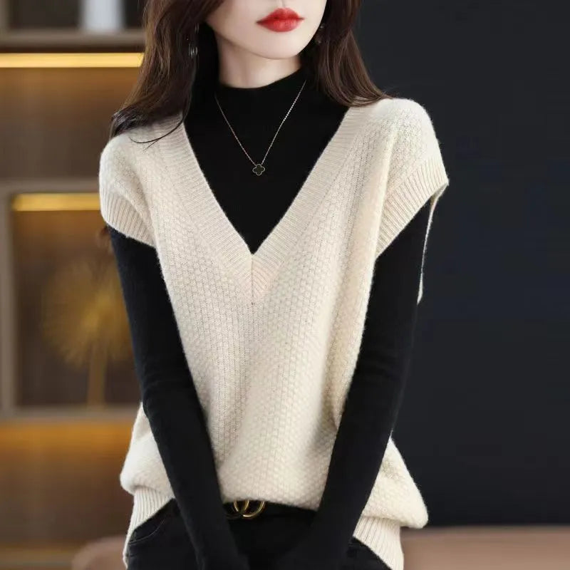 Women's creamy-white V-neck sleeveless vest with 3D knit pattern for commute wear