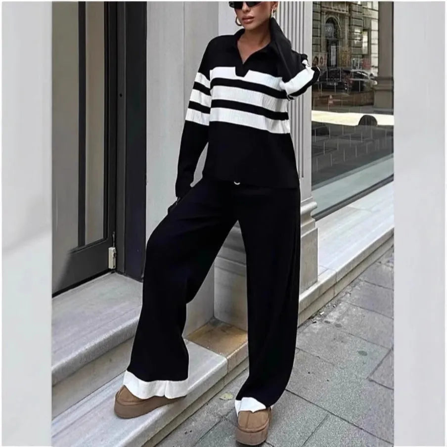 Women's black and white striped knitted polo shirt with matching trousers two-piece set