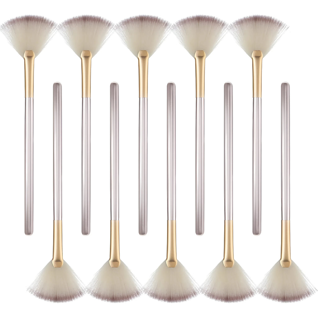 10 professional facial fan makeup brushes with champagne finish and acrylic handles, shown with brush covers.