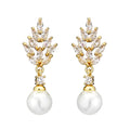 Geometric flower earrings with micro inlaid zircon and pearl detailing in gold plating
