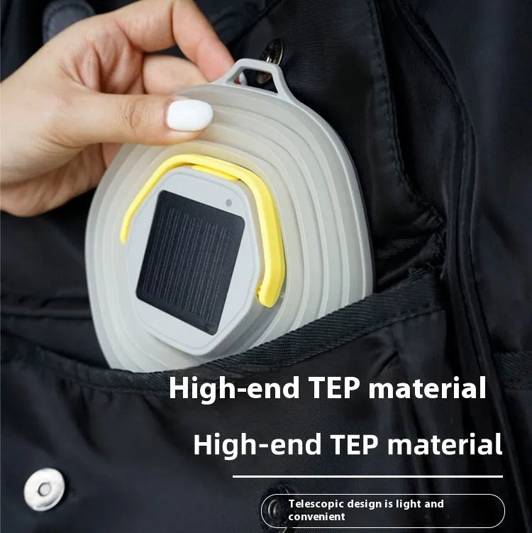 White portable camping lamp with large capacity battery and a single control button.