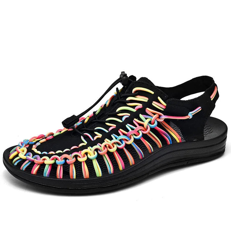 Woven Roman sandals with an elastic drawstring tie in multiple colour options on a rubber sole.