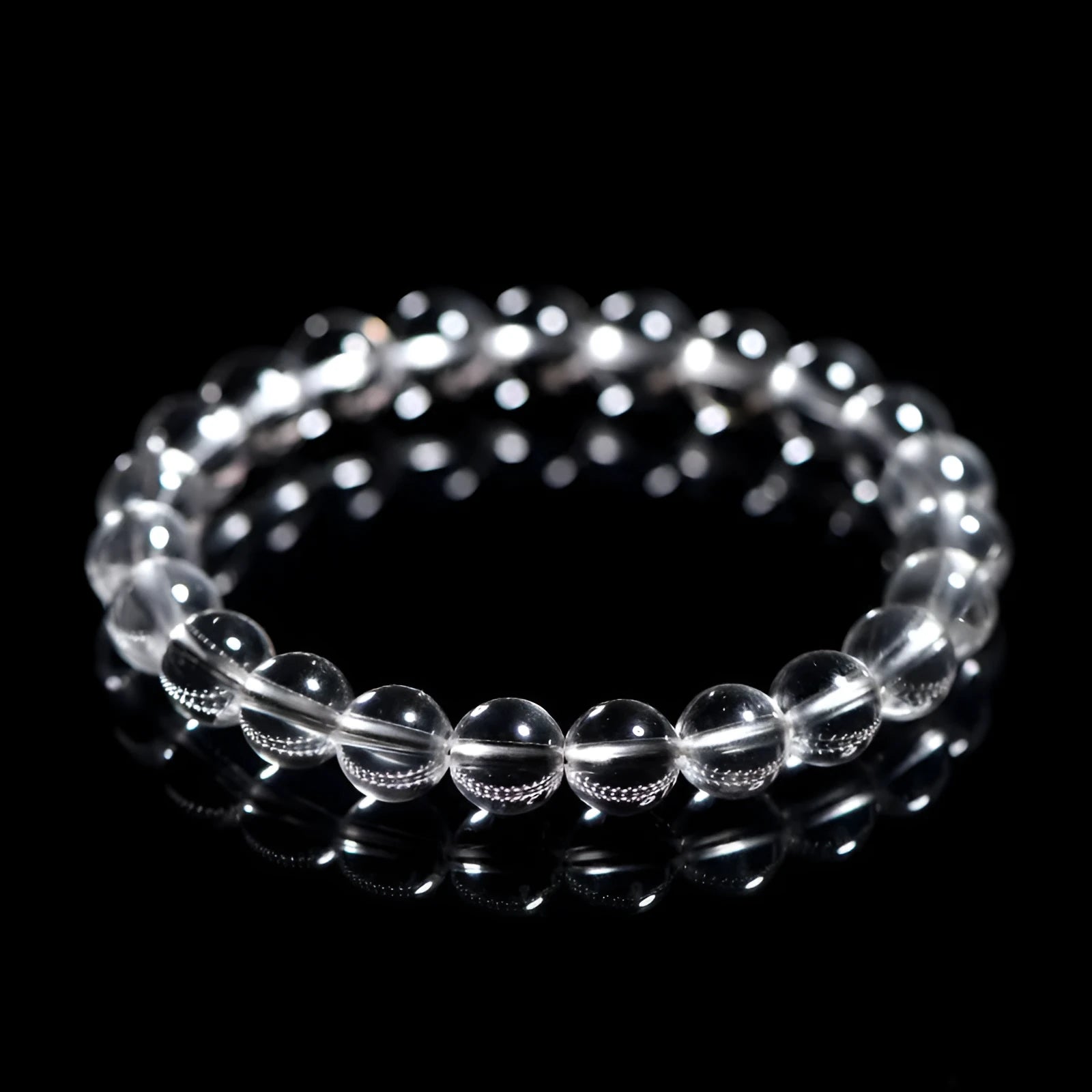 Natural Donghai old mine white crystal geometric bracelet with round beads.