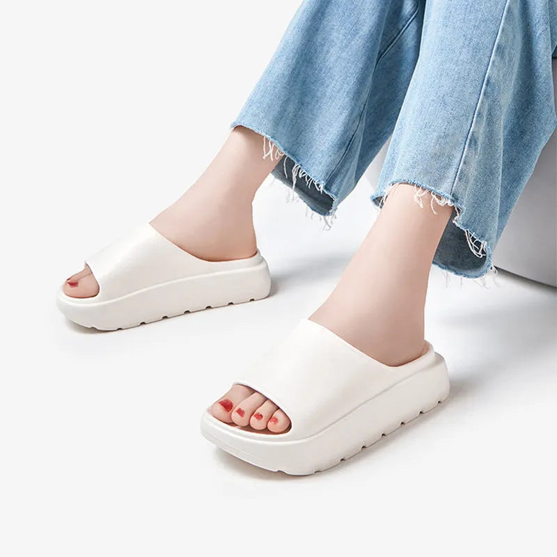 Women's beige fish mouth slippers with a thick 5.5cm sole for beach and bathroom use.