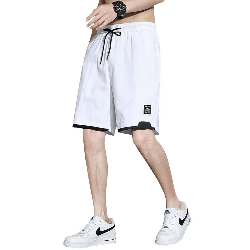 Boys' loose-fit cotton shorts in black, available in plus sizes for summer comfort.