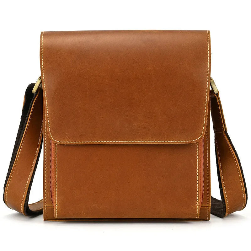 Brown men's leather crossbody shoulder bag with visible stitching and a long strap.