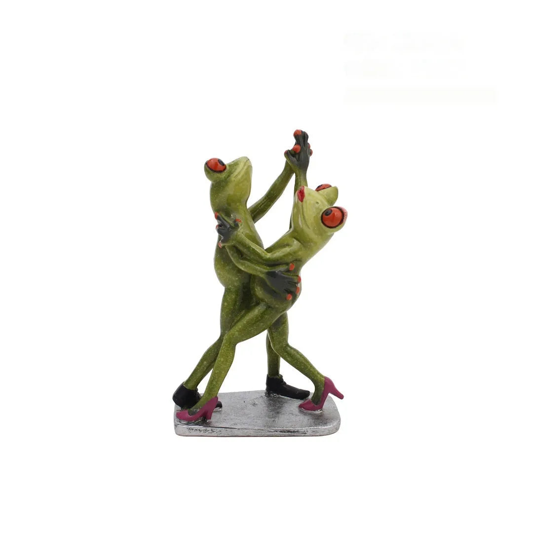 Pastoral style synthetic resin frog figurine home decoration on a wooden surface.