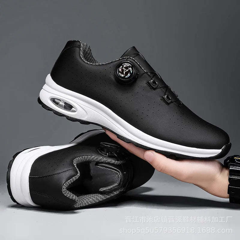Black and white low-top mesh casual shoes with cross shoulder straps and a composite sole.