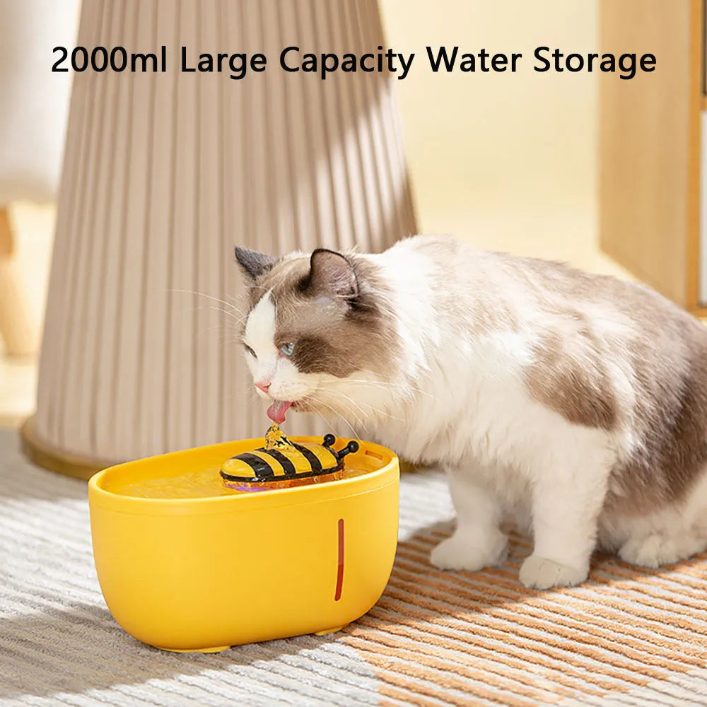 Yellow cat water fountain with filtration system and USB power cable