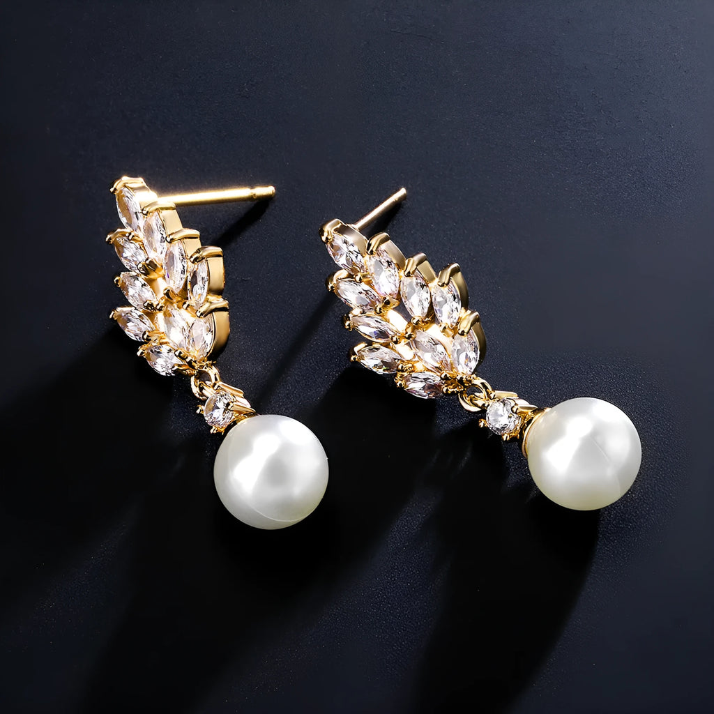 Geometric flower earrings with micro inlaid zircon and pearl detailing in gold plating