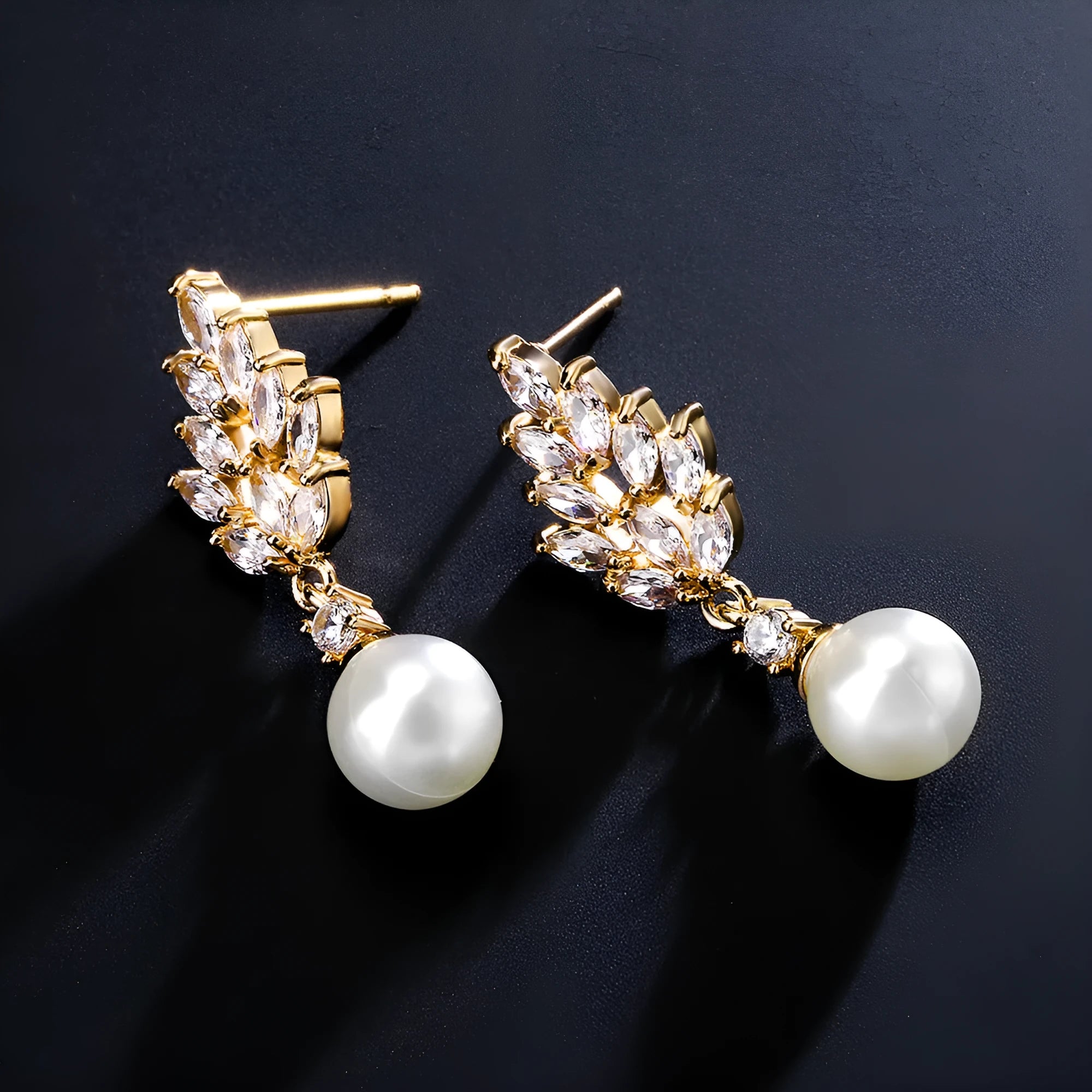 Geometric flower earrings with micro inlaid zircon and pearl detailing in gold plating