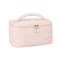 Open-top cake-shaped makeup bag in PU leather, shown in a solid colour from the pink, coffee, beige, blue, green, purple range.