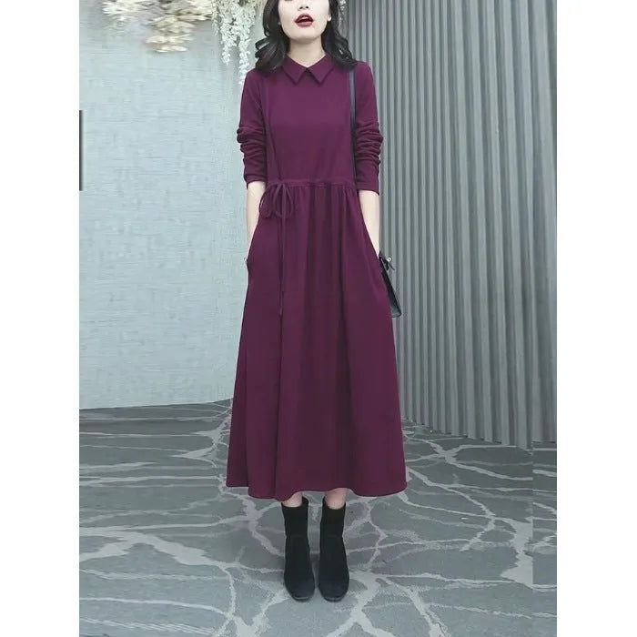 Purplish red plus size women's dress with long skirt and extra long sleeves for urban office wear