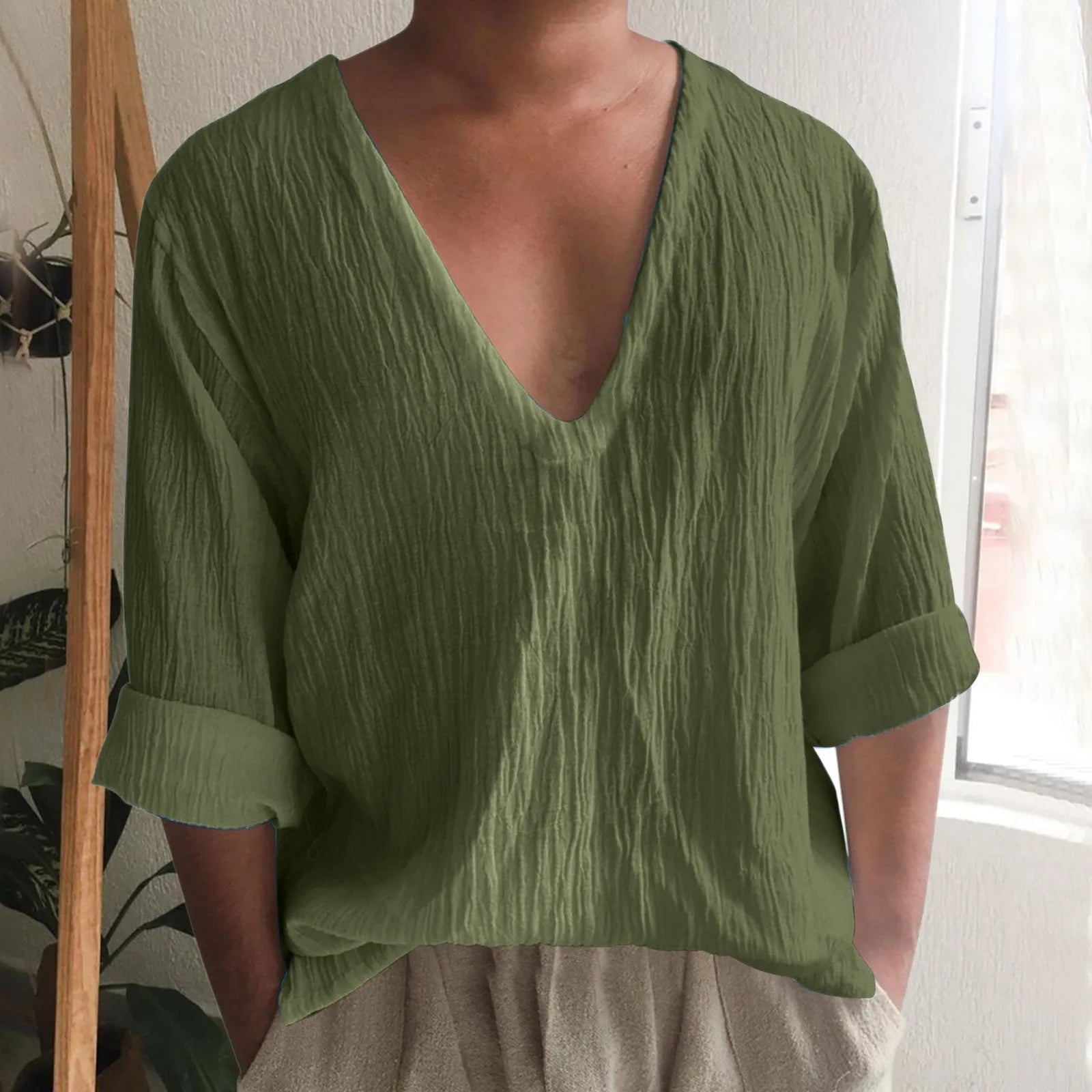 Men's long sleeve V-neck t-shirt in washed cotton solid colour.