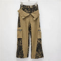 Women's retro high waist jeans with leopard print tooling style and fake two stitching on dark khaki denim