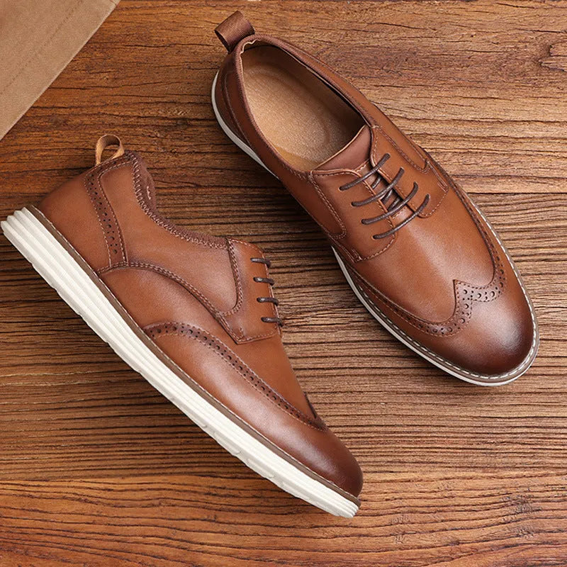 Men's black and brown slip-on business casual shoes with round toe and carving details on low-top PU upper