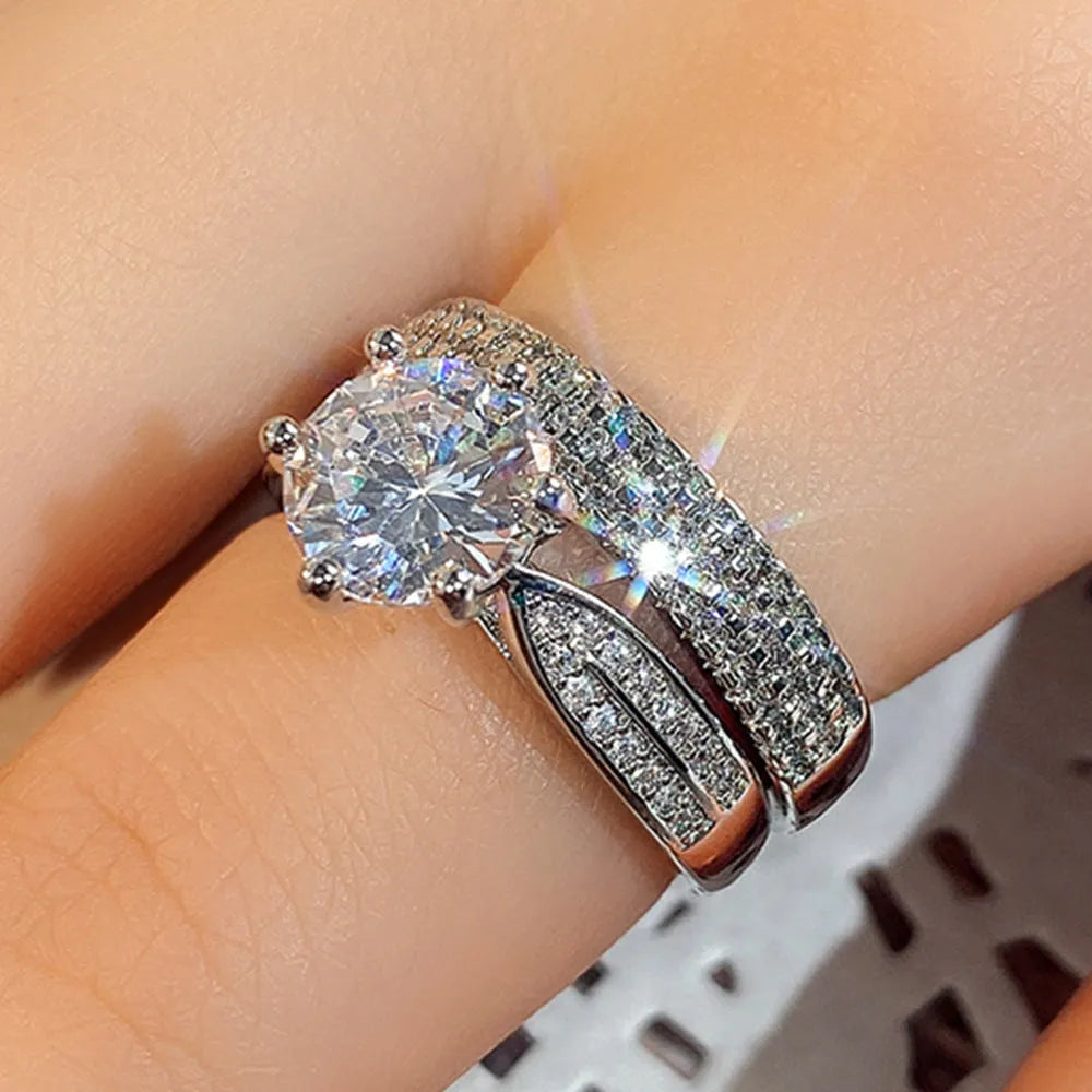White gold colour combined ring and bracelet jewellery with geometric shape and round elements