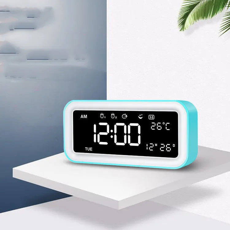 Rectangular blue LED alarm clock with quartz glass display and multicoloured atmosphere lighting functions