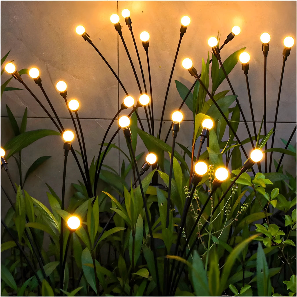 Solar-powered LED garden light with ground spike showing automatic light control for dusk-to-dawn operation