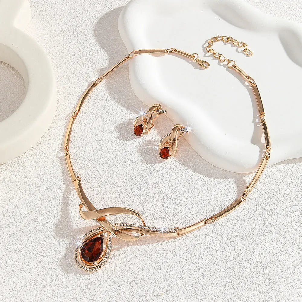 Gold Inlaid White Rhinestone Brown Crystal Necklace and Earrings Suite for Women V-Shaped Alloy Pendant with Fishtail and Fan-Shaped Elements Exaggerated Style