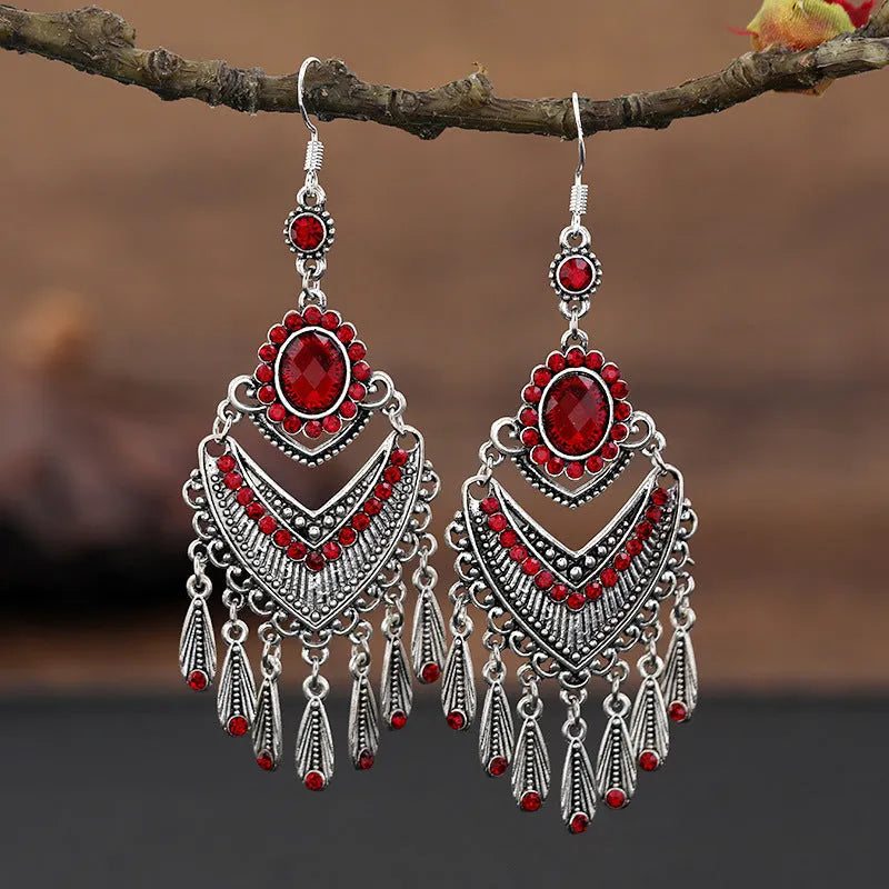 Purple drop shape fringe earrings with retro crystal detailing and ethnic style elements