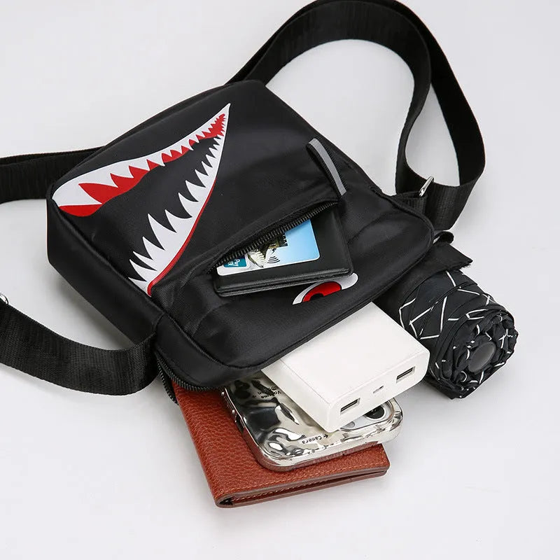 Men's small black Oxford cloth crossbody bag with animal print and shoulder strap