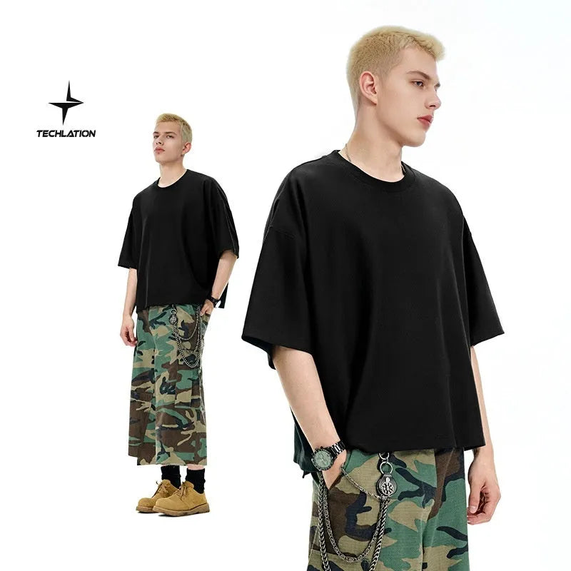 Men's sand grey loose fit short sleeve t-shirt showing regular sleeves and pullover style