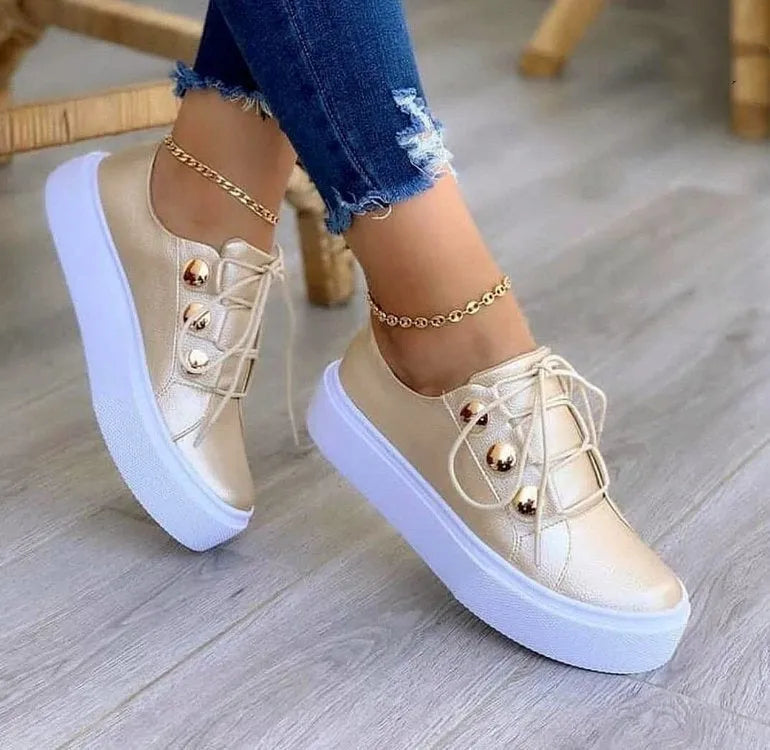 Women's white lace-up flats sneakers with rivet decoration and round toe design