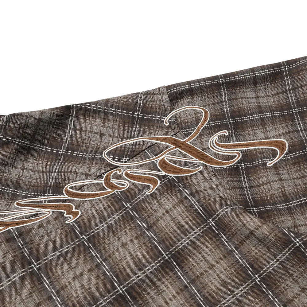 Men's black and brown plaid short sleeve shirt with embroidered lapel detail