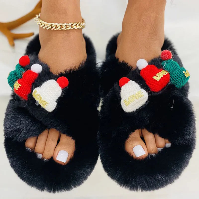 Women's black Christmas hat design faux plush slippers with a hairy texture and rubber sole.
