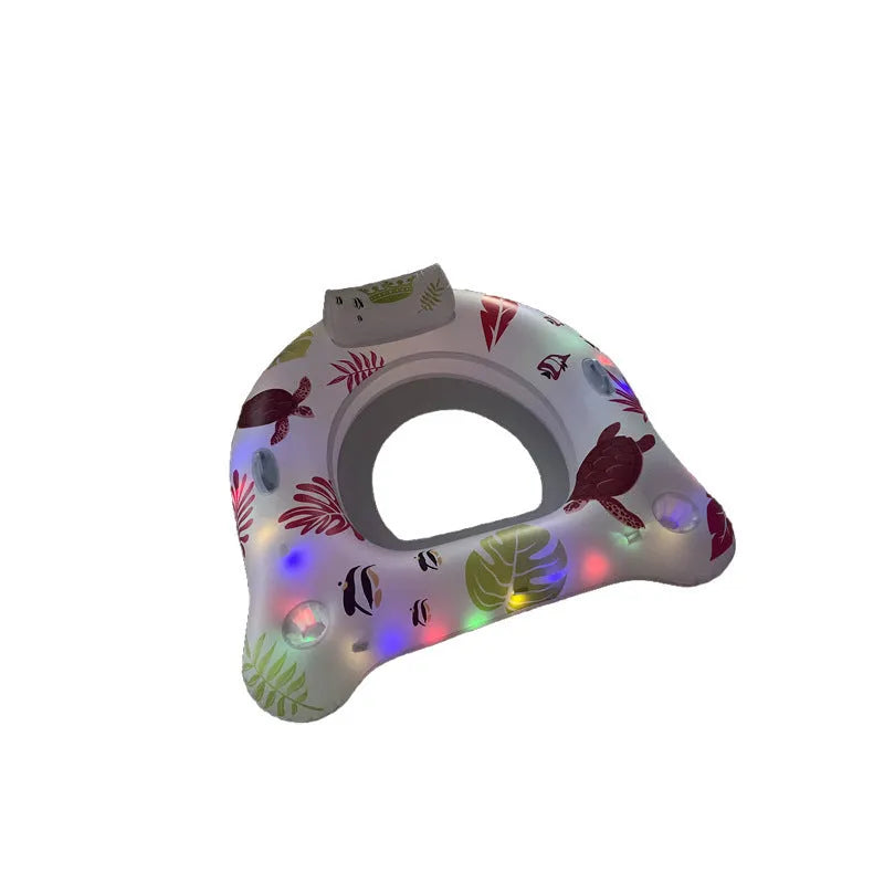 White U-shaped inflatable float with luminous features floating in water