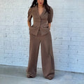 Men's brown slim fit polyester suit with waist-length top and matching trousers