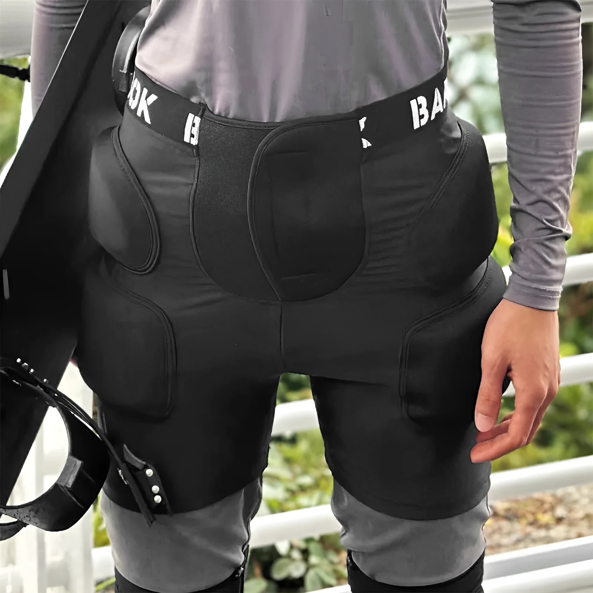 Black spandex hip protection pants with NBR foam padding for roller skating and skateboarding safety